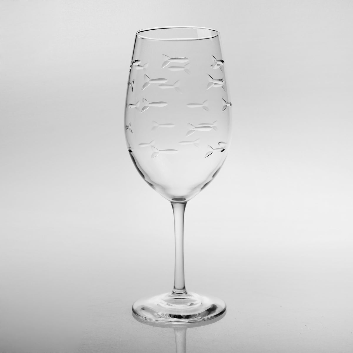 http://www.maisonbeach.com/cdn/shop/products/600260-School-of-Fish-AP-Wine-18oz-rolf-glass-2.jpg?v=1527083799&width=1200